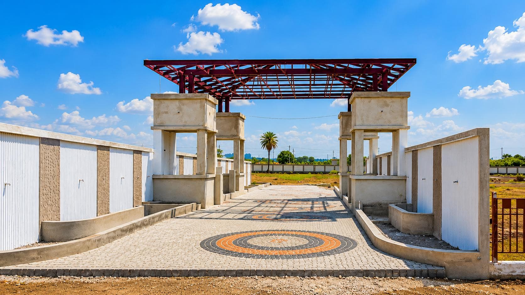 JMG Aero City entrance gate with patterned paving