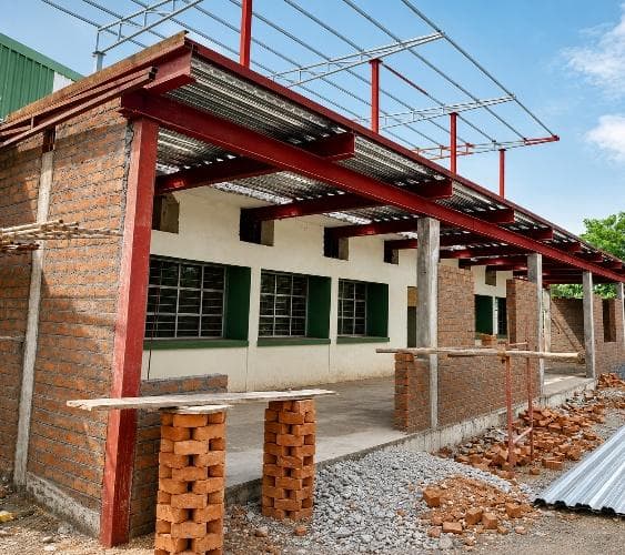 Steel roof structure over building